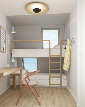 Habitación familiar, varias camas, vistas al mar | Cortinas opacas, cunas gratuitas, ropa de cama