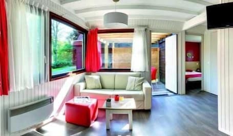 Chalet, 2 Bedrooms (5 Pers) | Living room | Flat-screen TV. VVF Les Vosges Bitche