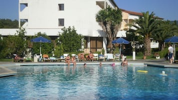 Seasonal outdoor pool, open 10:00 AM to 8:00 PM, pool umbrellas