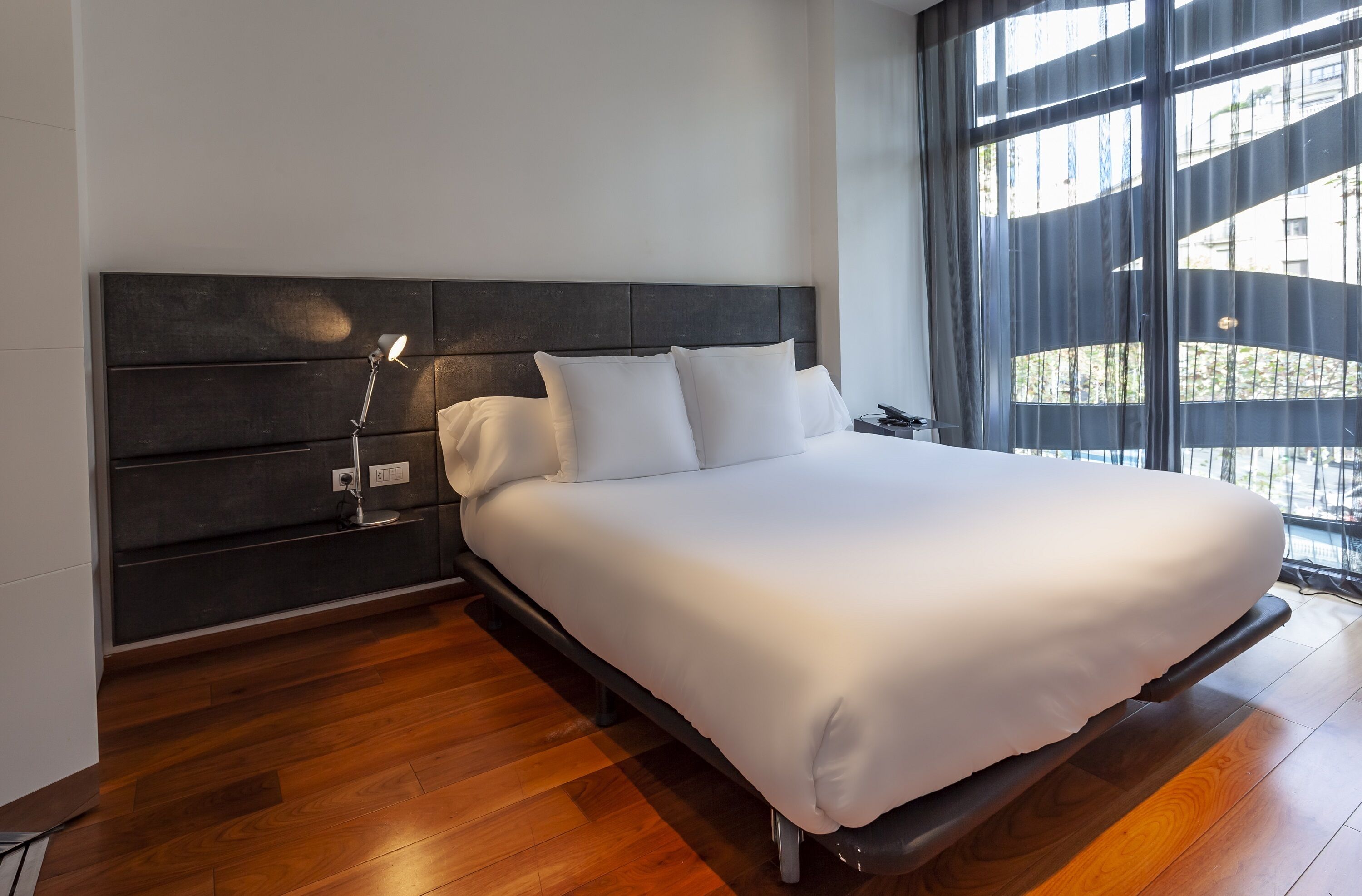 Premium bedding, down comforters, minibar, in-room safe