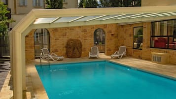 Indoor pool, outdoor pool, open 7:00 AM to 11:00 PM, pool umbrellas
