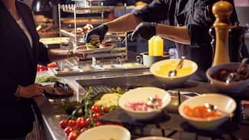 Breakfast, lunch, dinner served; alfresco dining