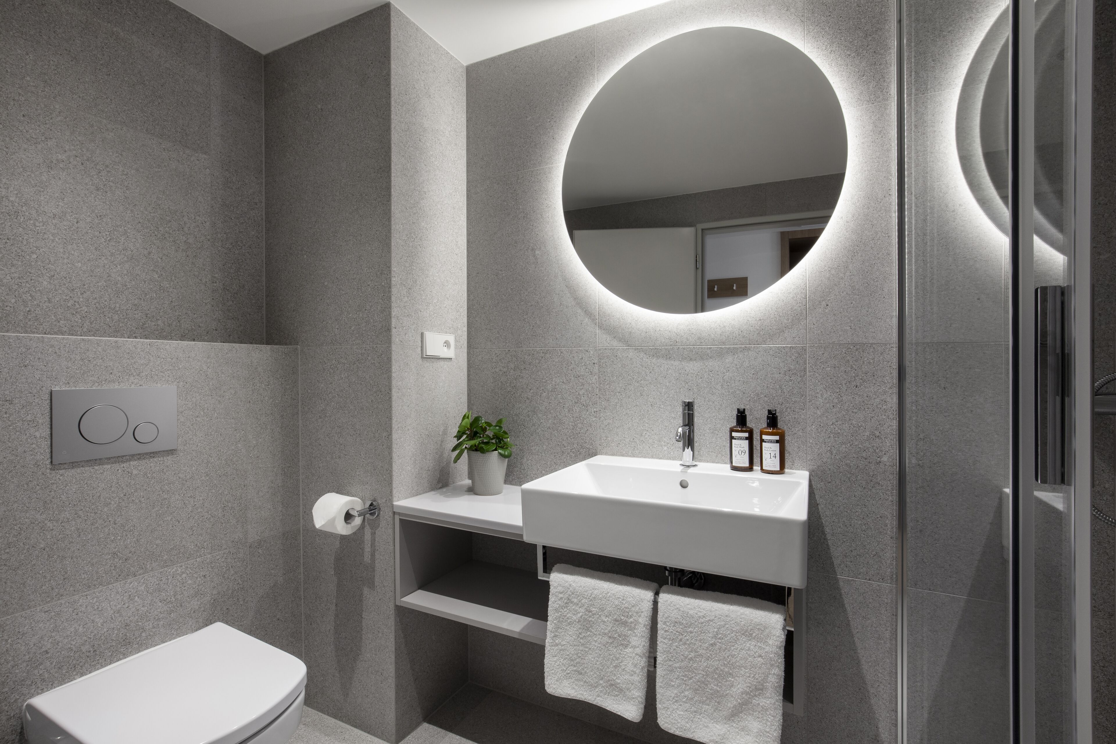 shower, rainfall showerhead, designer toiletries, hair dryer