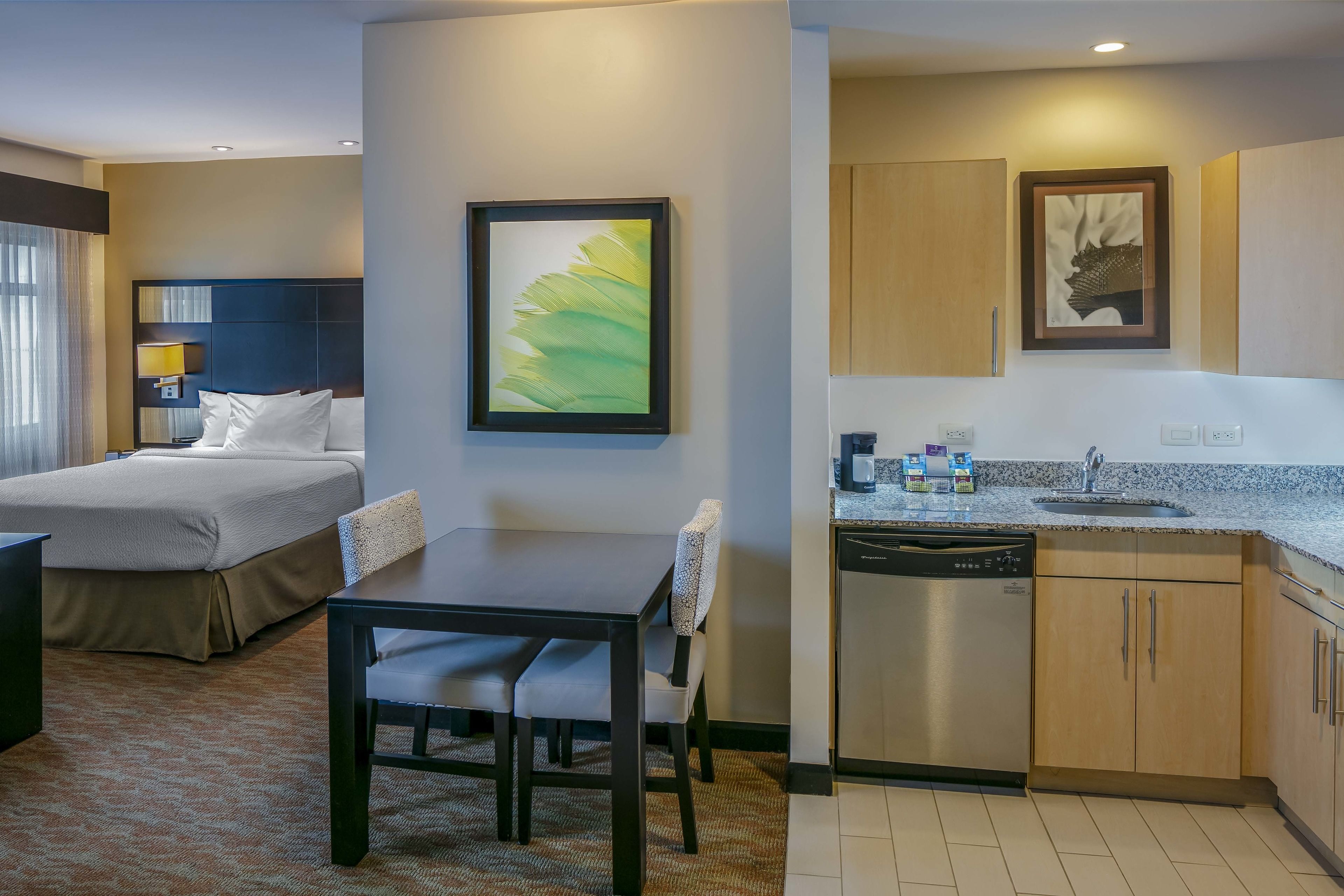 studio, 1 queen bed with sofa bed | private kitchen | full-sized fridge, microwave, stovetop, dishwasher