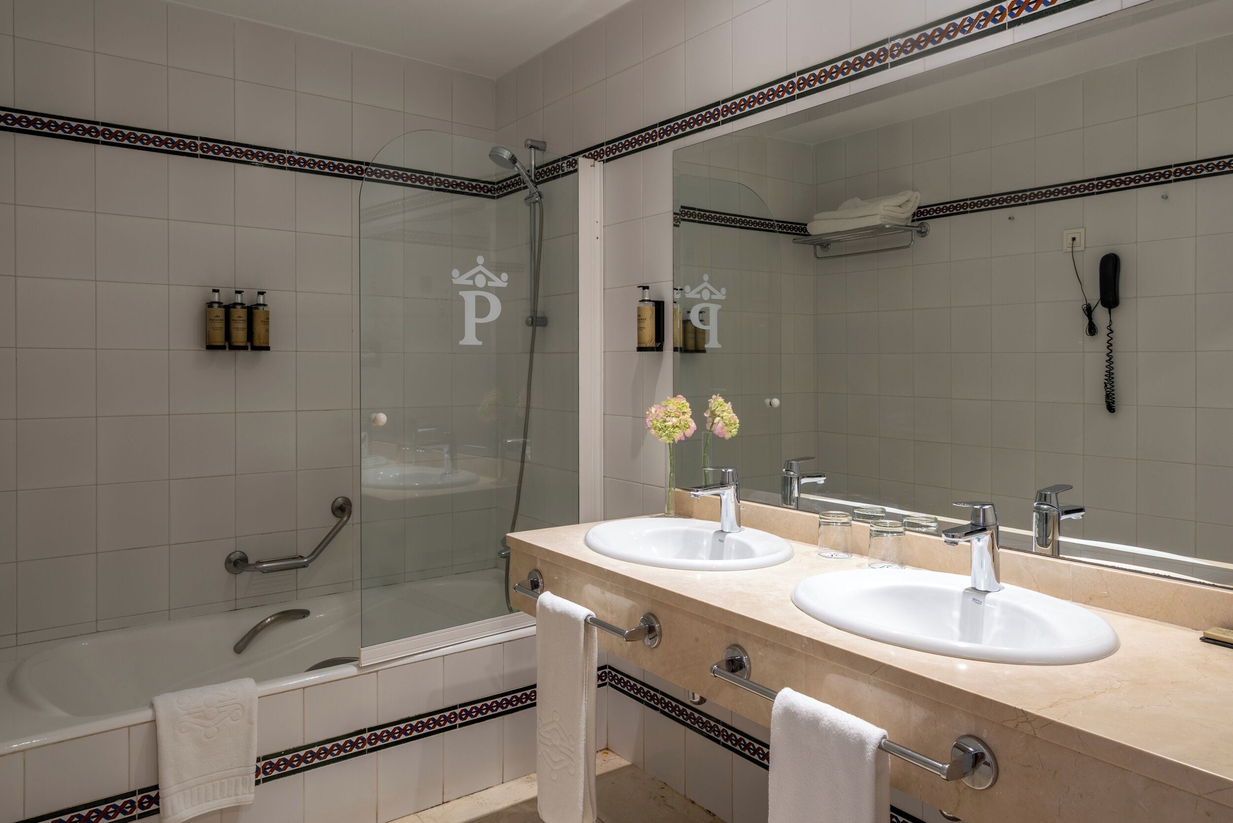 deep-soaking bathtub, eco-friendly toiletries, hair dryer, bidet