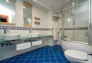 Hair dryer, slippers, towels, soap