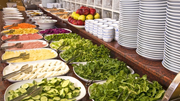 A buffet with various food items including fruits, vegetables, and cheeses. - Hotel Buyuk Keban (Istanbul)