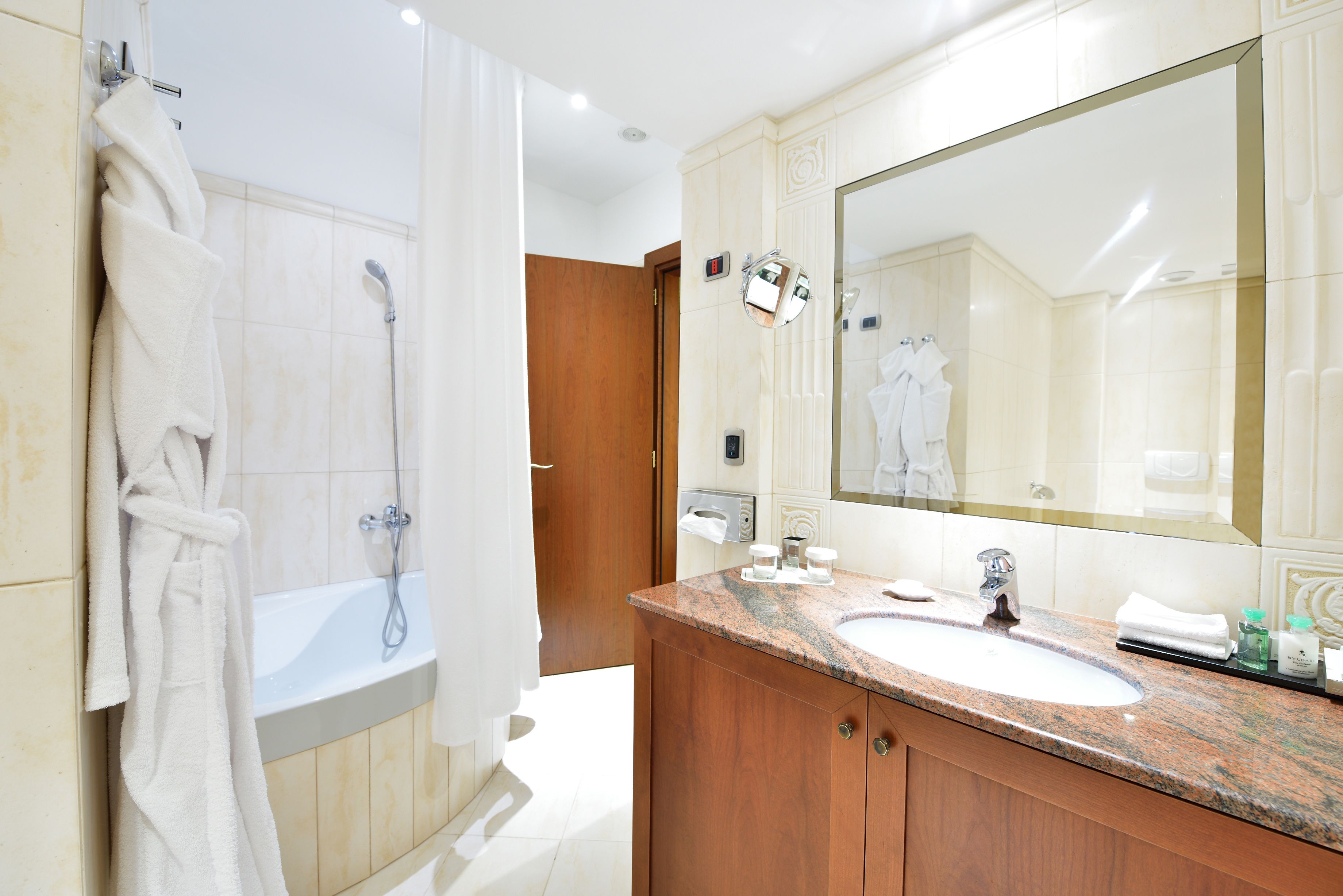 suite, mountain view | bathroom | designer toiletries, hair dryer, bathrobes, slippers