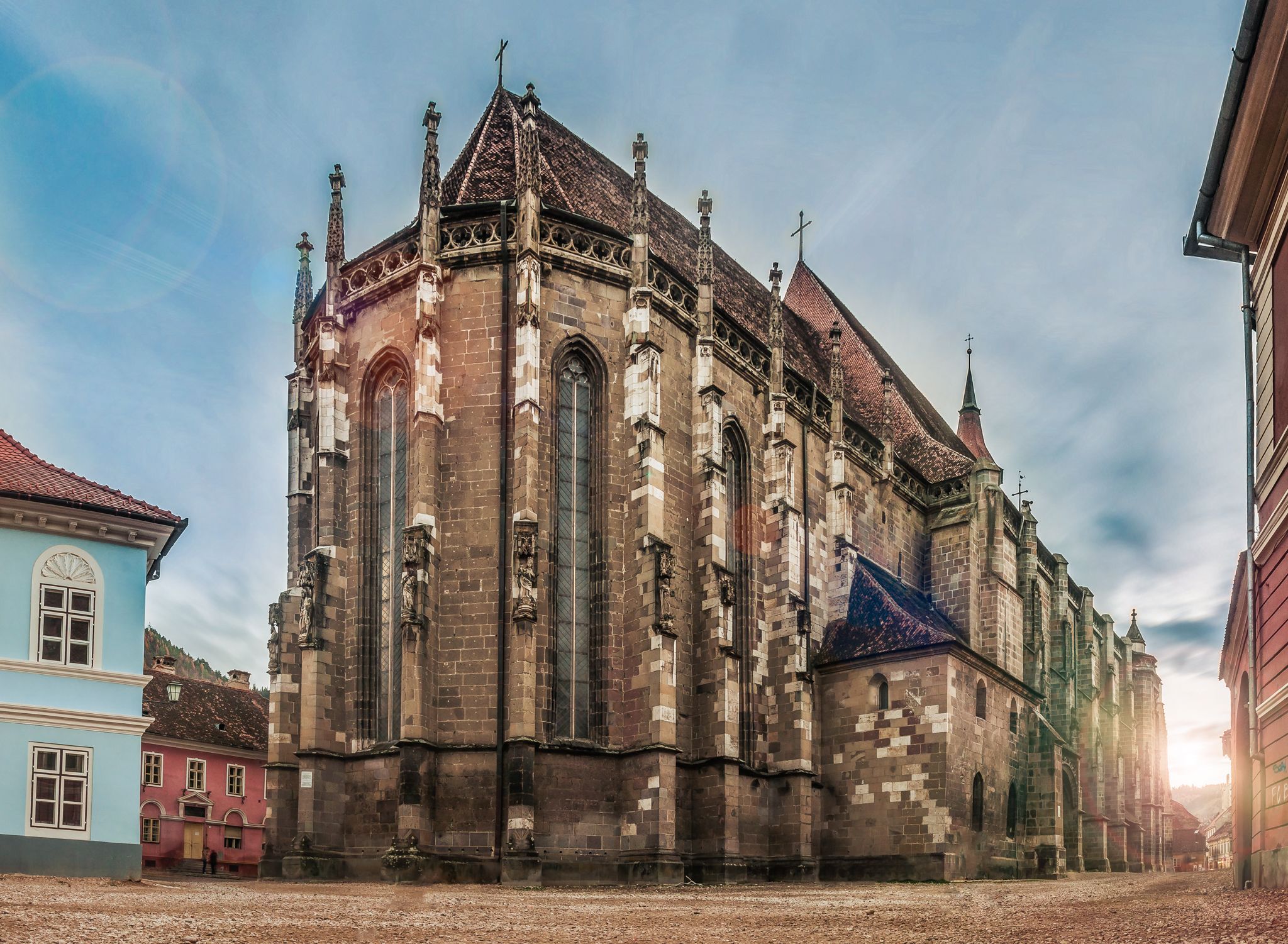 A historic church with Gothic architecture, featuring pointed arches and a large central tower.
