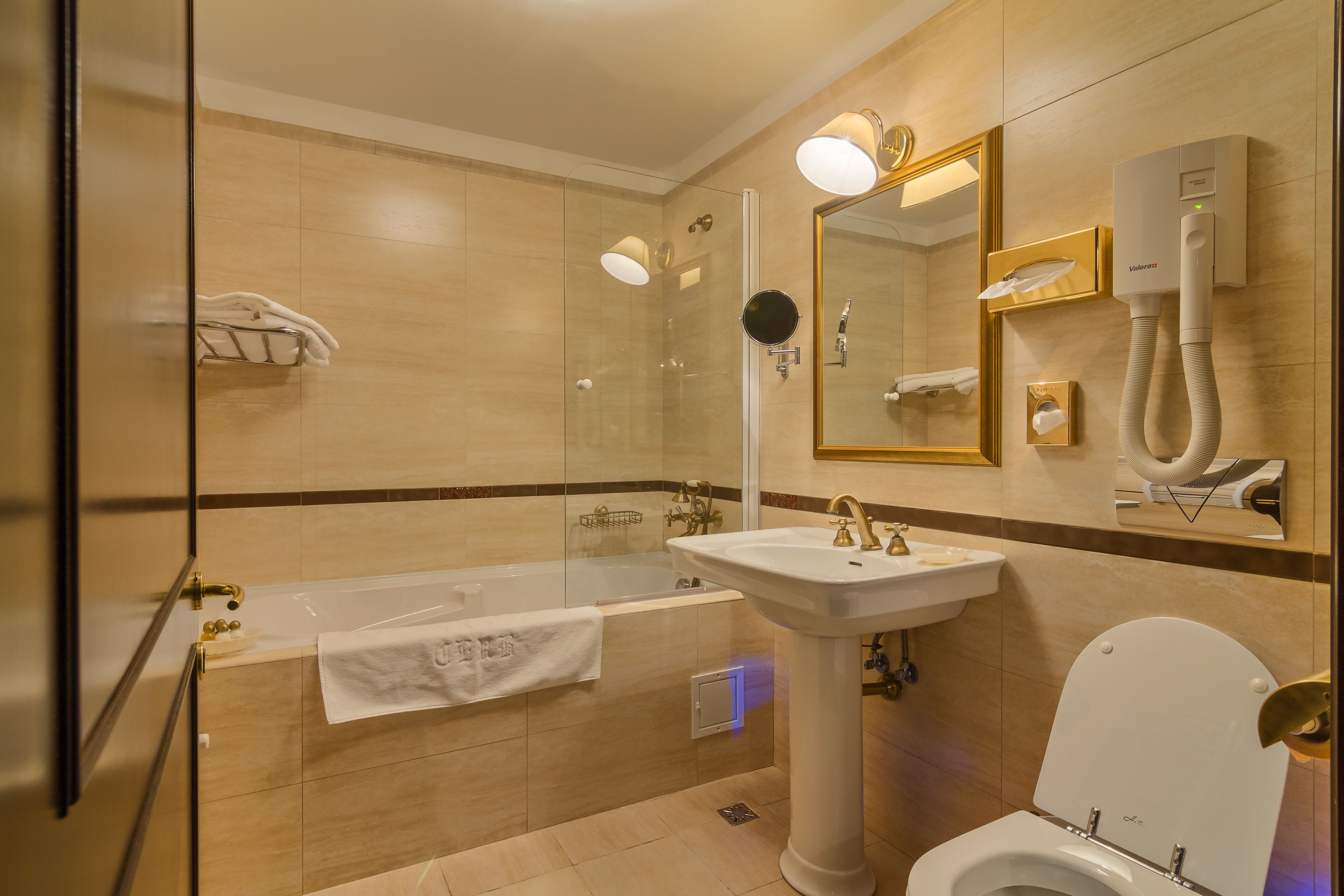 deluxe double room | bathroom | bathtub, free toiletries, hair dryer, dressing gowns