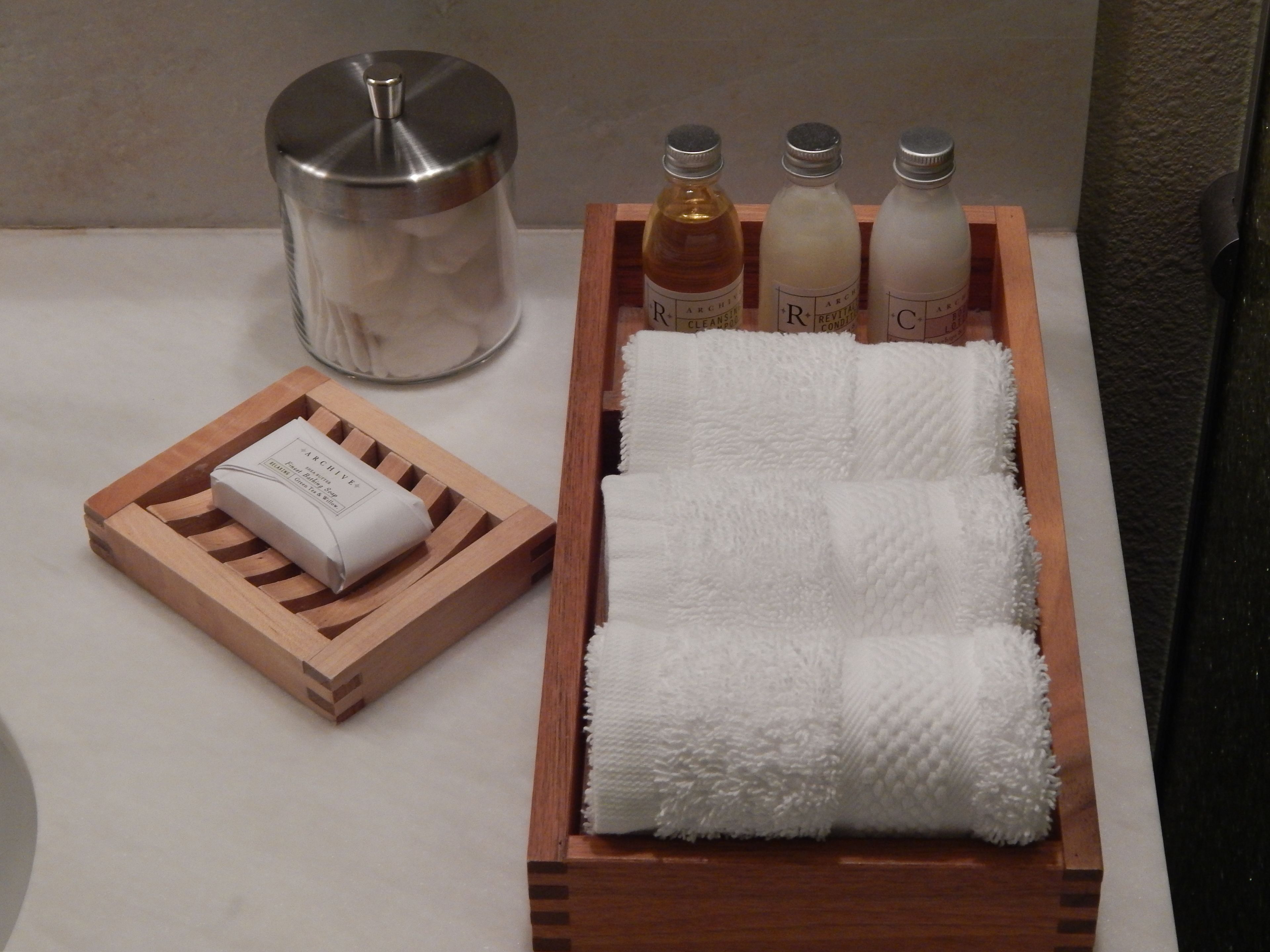 combined shower/bathtub, designer toiletries, hair dryer, bathrobes