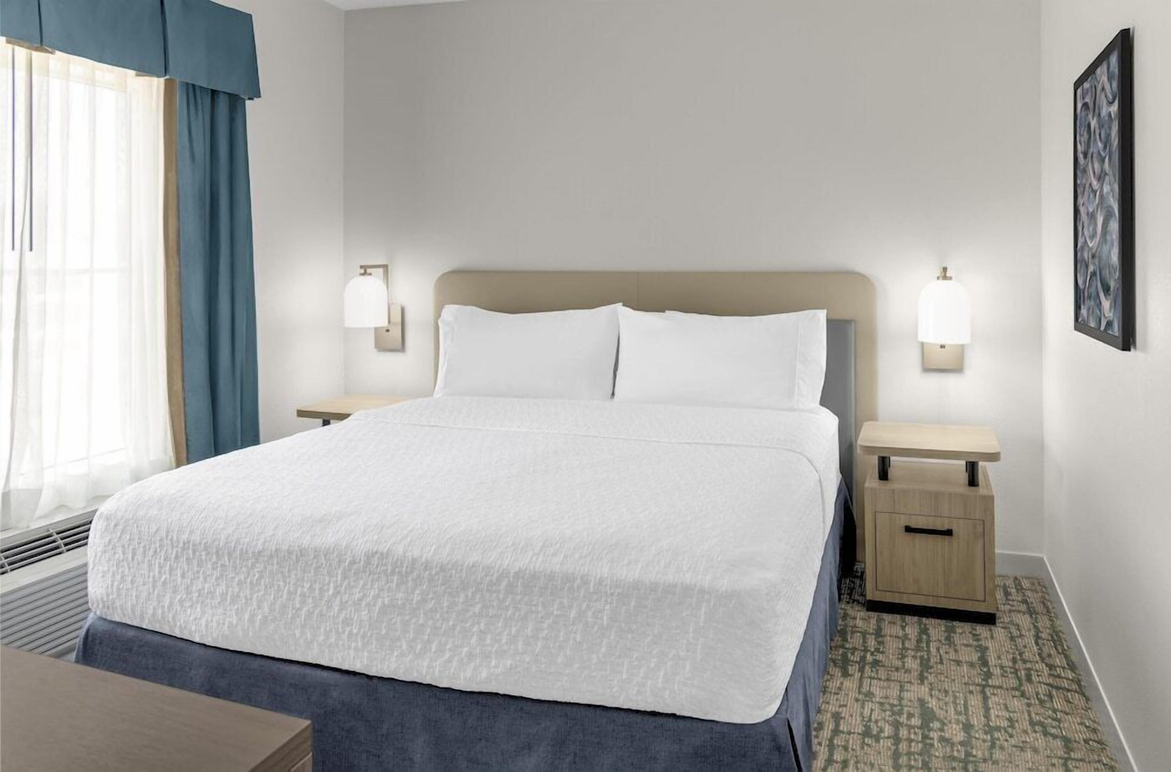 Hypo-allergenic bedding, desk, blackout drapes, iron/ironing board