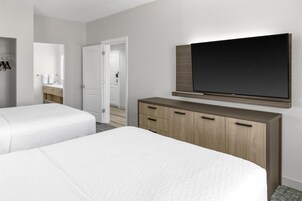 Hypo-allergenic bedding, desk, blackout drapes, iron/ironing board