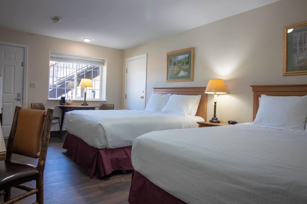 Pillow-top beds, desk, blackout curtains, iron/ironing board