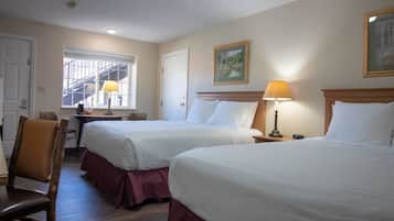 Pillowtop beds, desk, blackout drapes, iron/ironing board