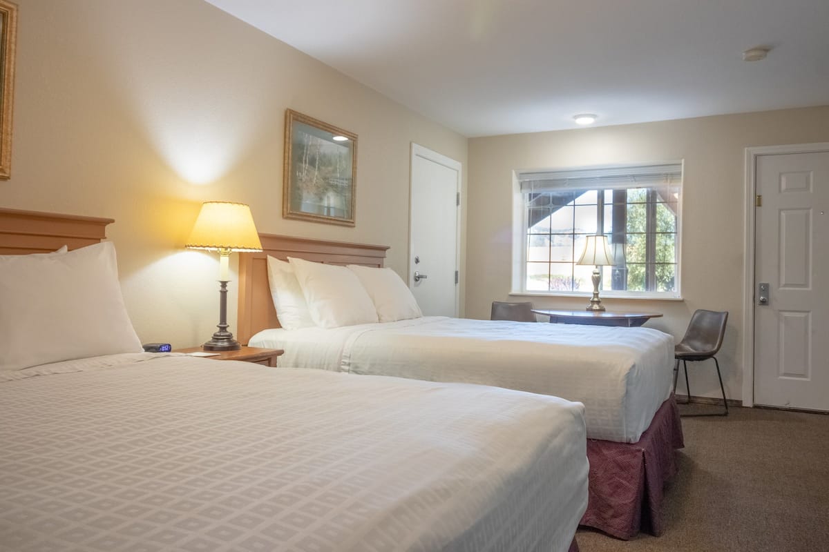 Pillow-top beds, desk, blackout curtains, iron/ironing board