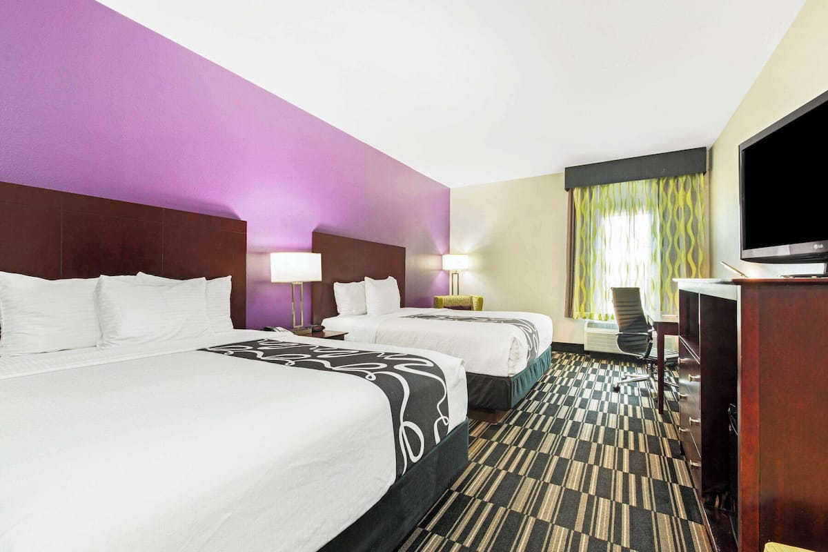 Room, 2 Queen Beds, Non Smoking | Down comforters, pillowtop beds, in-room safe, desk