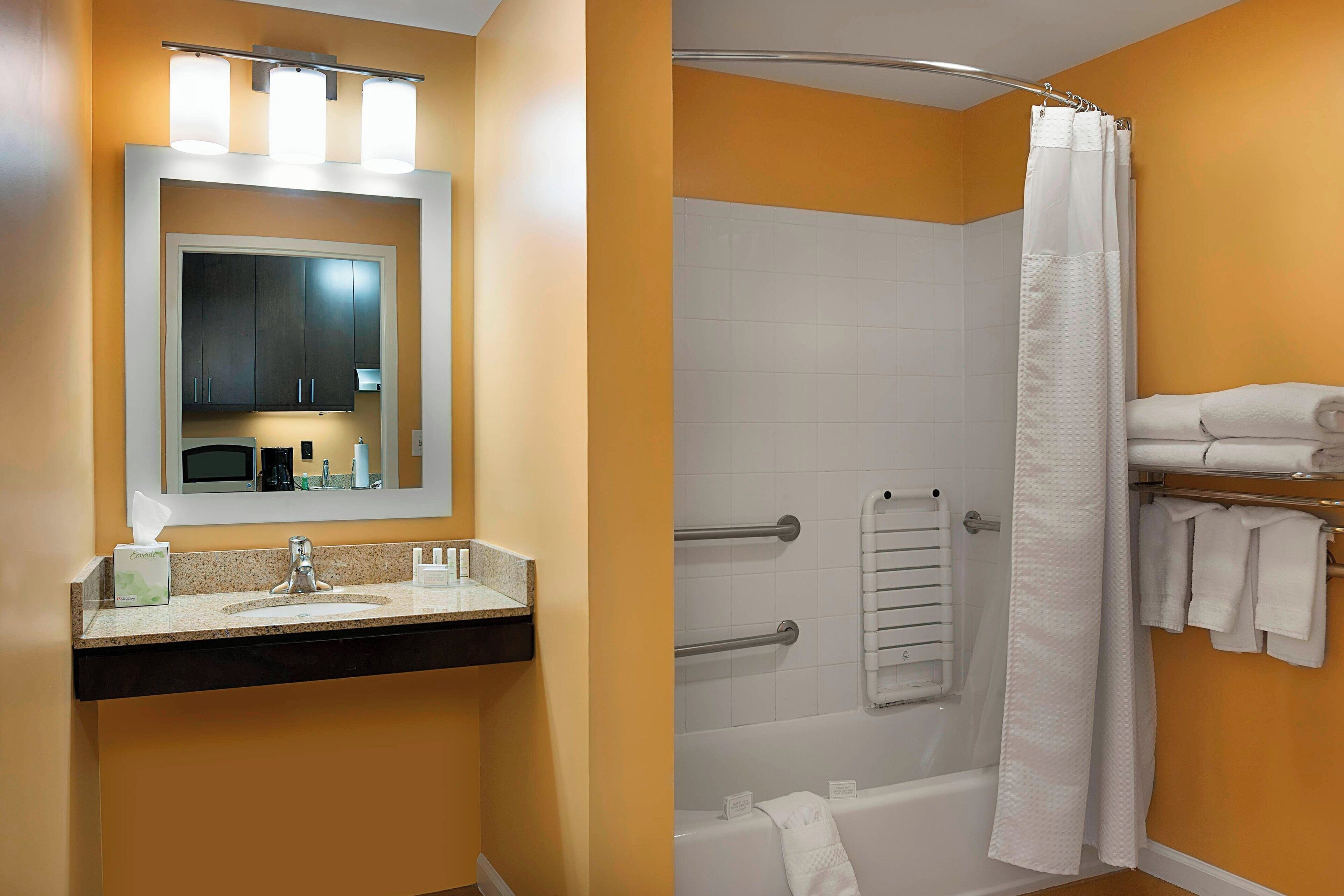 combined shower/bathtub, free toiletries, hair dryer, towels