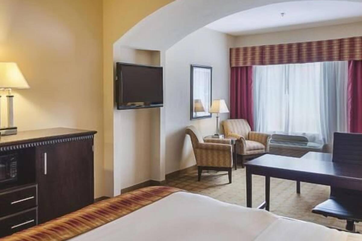 Premium bedding, pillowtop beds, desk, blackout drapes