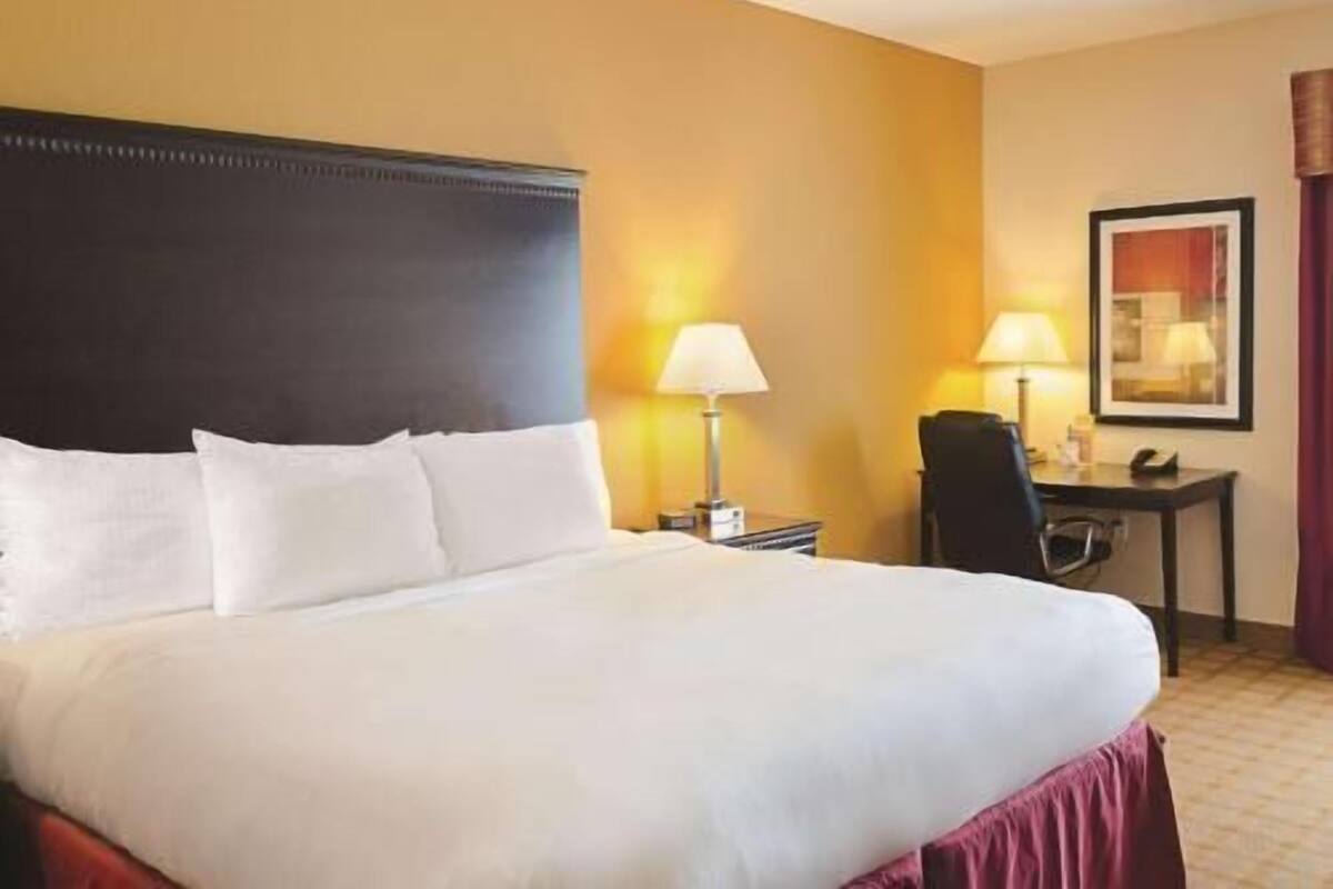 Premium bedding, pillowtop beds, desk, blackout drapes