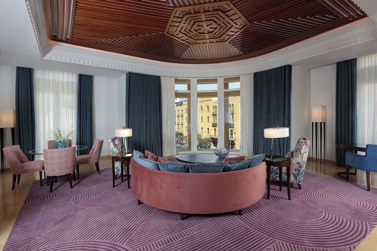 Suite, 1 King Bed, Corner | Living area | 32-inch plasma TV with satellite channels, TV, iPod dock