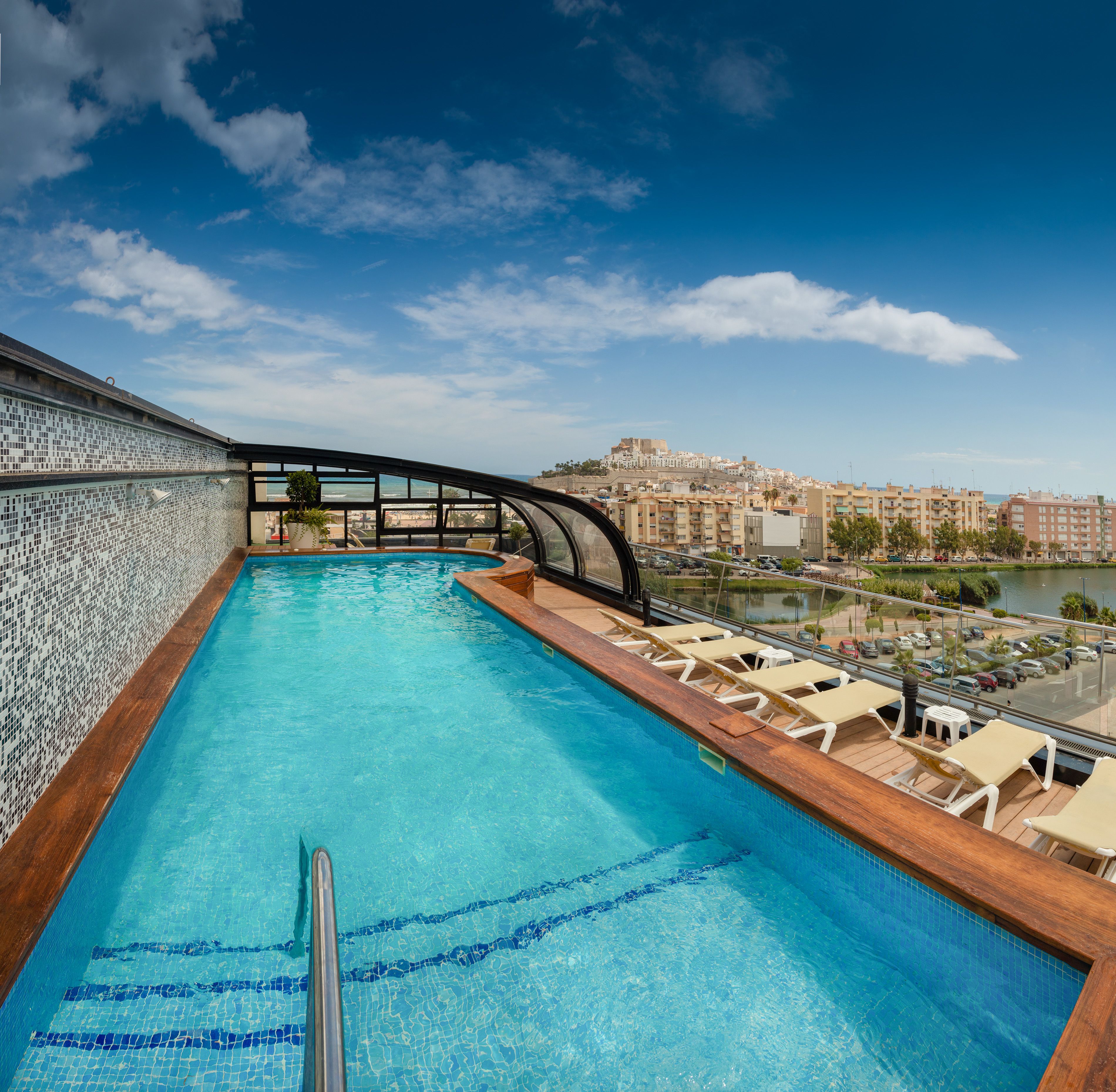 indoor pool, outdoor pool, pool umbrellas, pool loungers