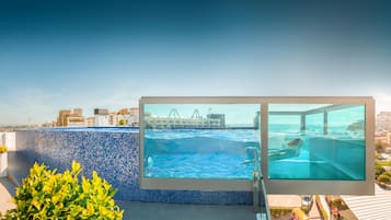 Indoor pool, outdoor pool, pool umbrellas, sun loungers