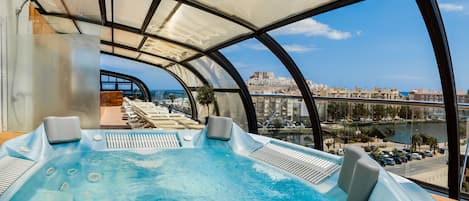 Indoor pool, outdoor pool, pool umbrellas, sun loungers