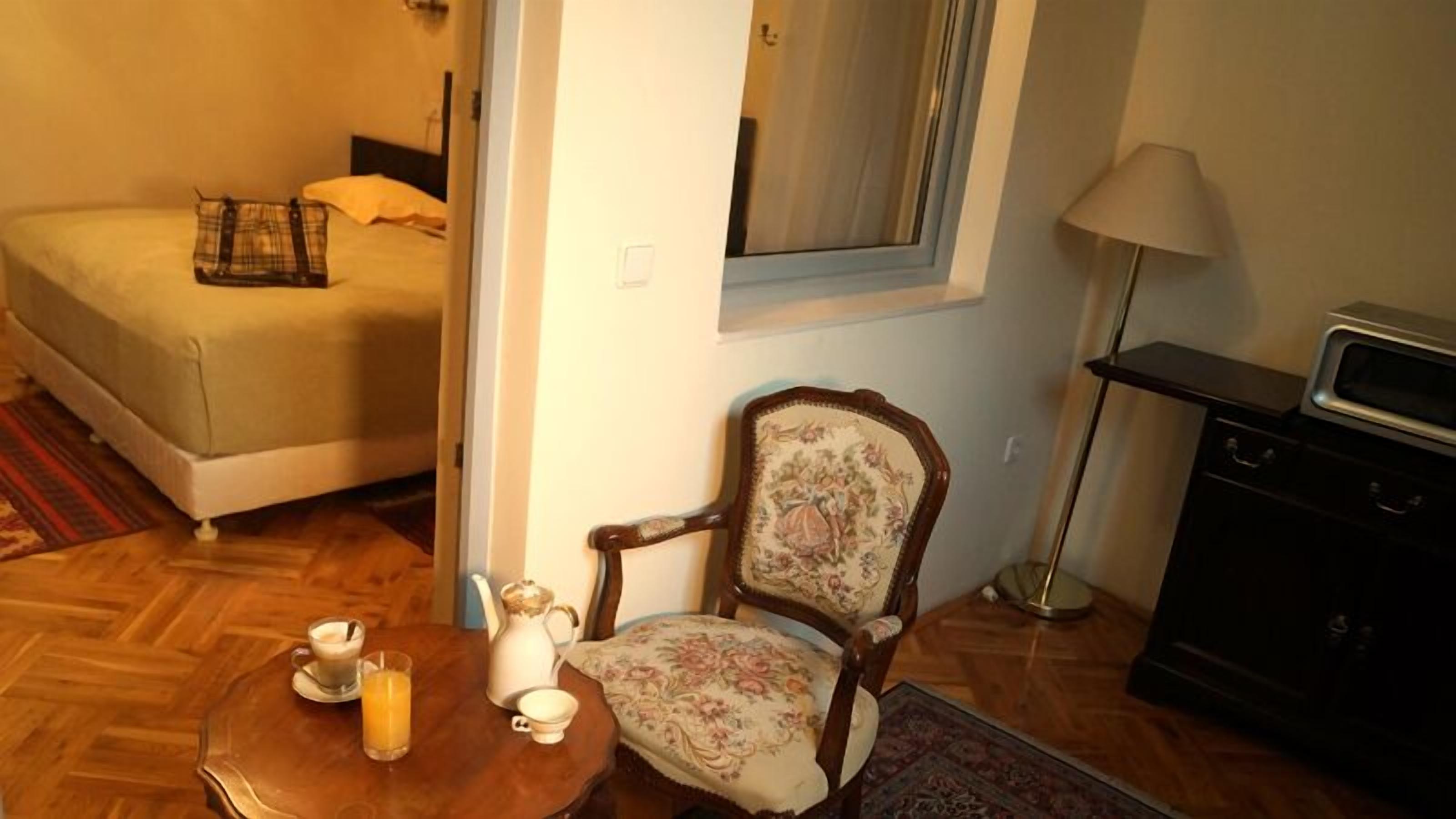 superior double or twin room | living area | tv, dvd player