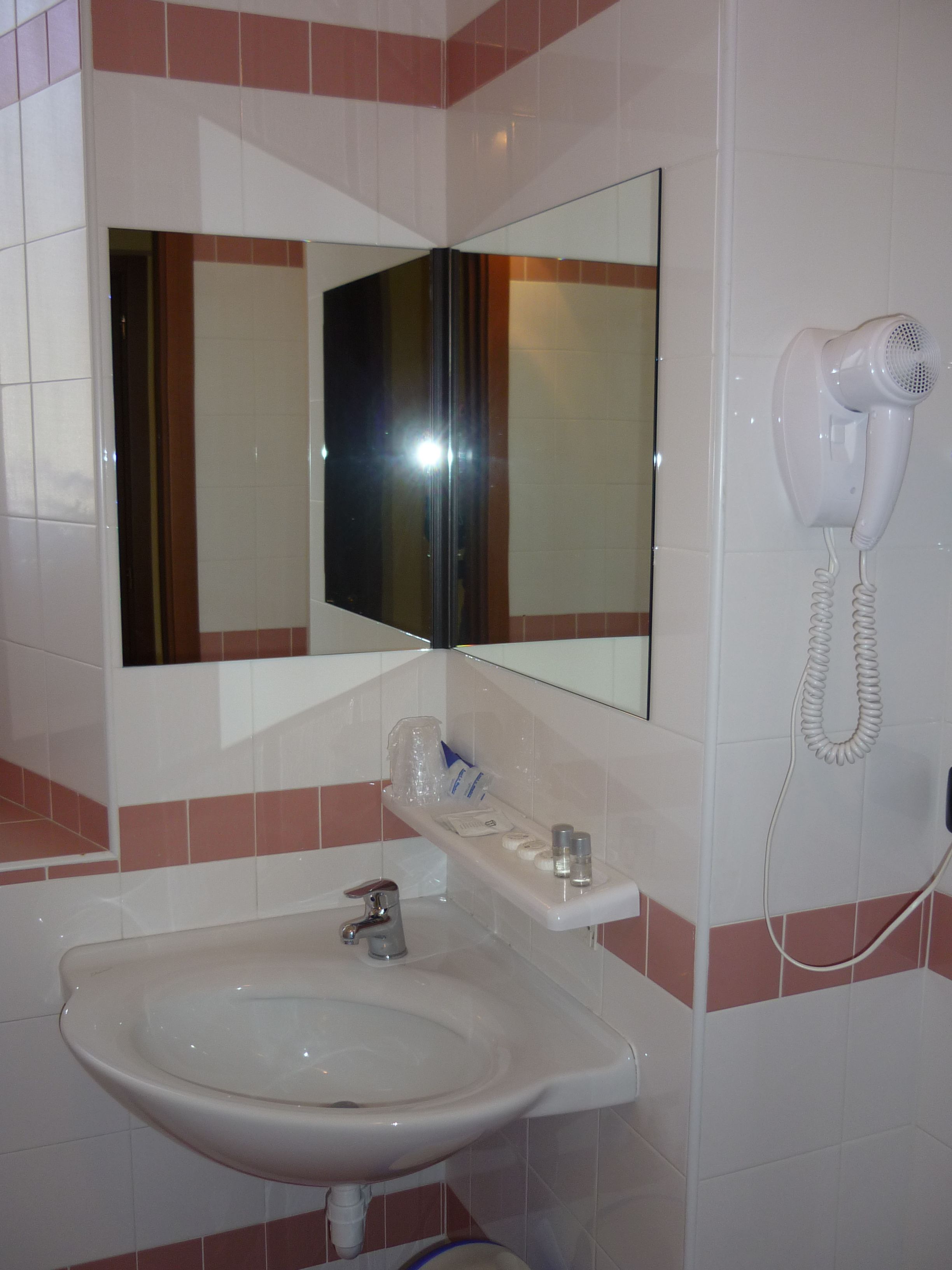 superior triple room | bathroom | shower, rainfall showerhead, free toiletries, hair dryer