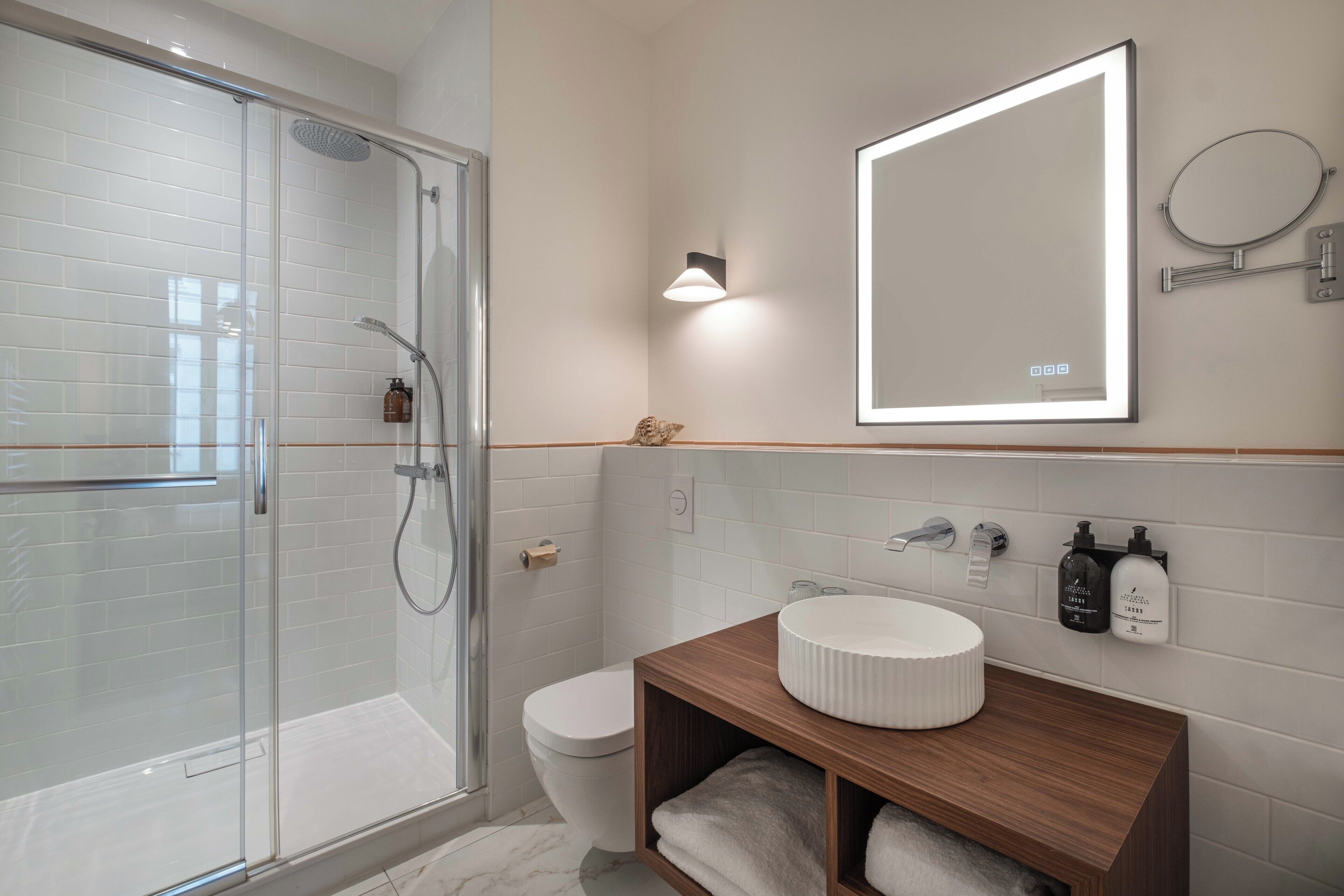 superior double room | bathroom | free toiletries, hair dryer, towels