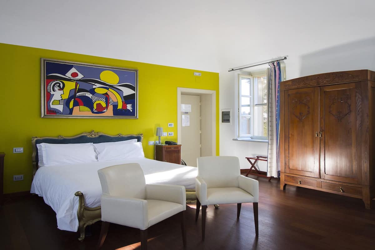 Executive suite, 1 slaapkamer, toegankelijk voor mindervaliden, terras | Donzen dekbedden, een minibar, een kluis op de kamer
