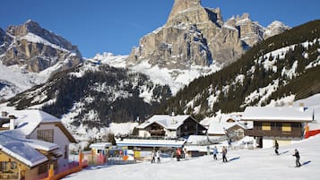 Experience skiing at this mountain resort, where guests can enjoy the slopes and scenic views.