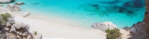 Vlak bij het strand, wit zand, vervoer van/naar het strand