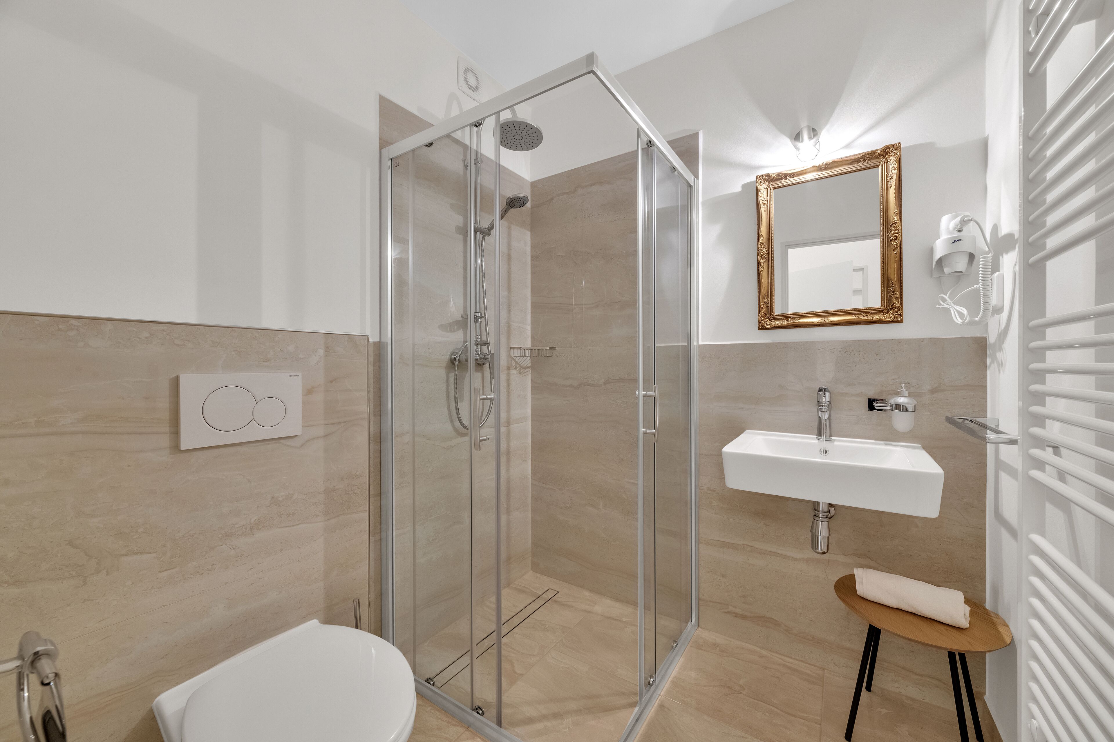 family room | bathroom | combined shower/bathtub, hair dryer, towels, soap