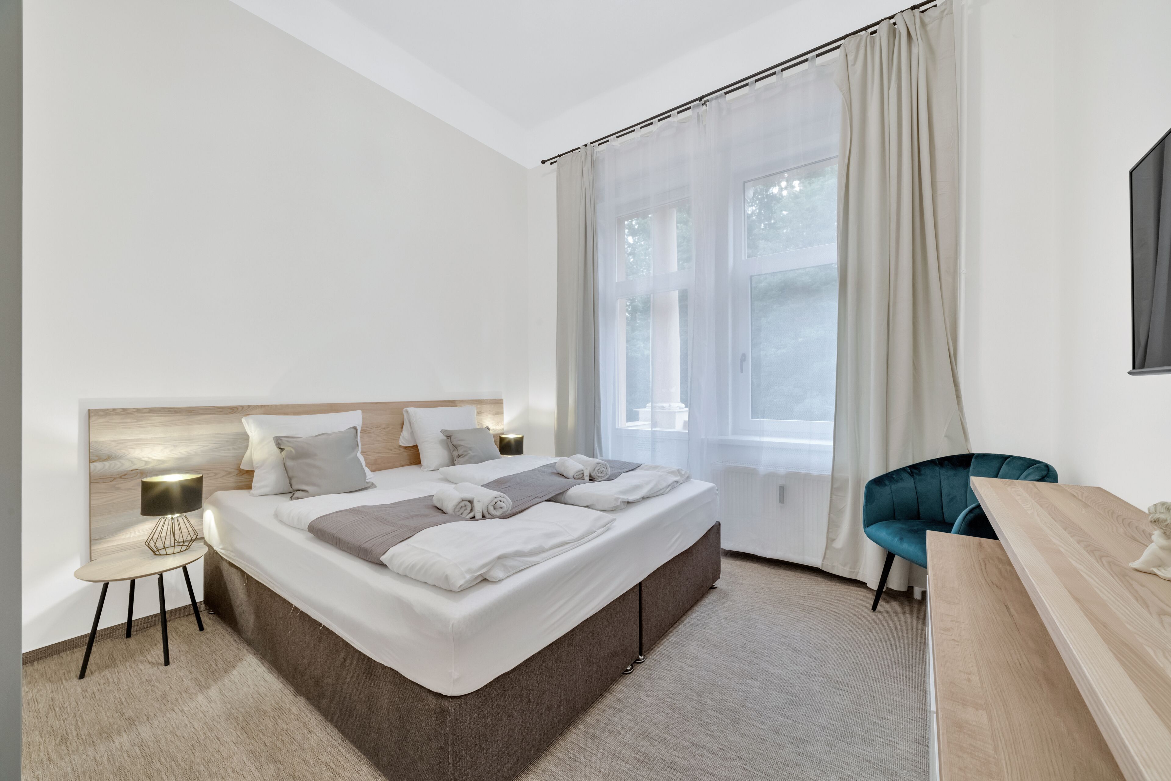 family room | in-room safe, desk, blackout curtains, iron/ironing board