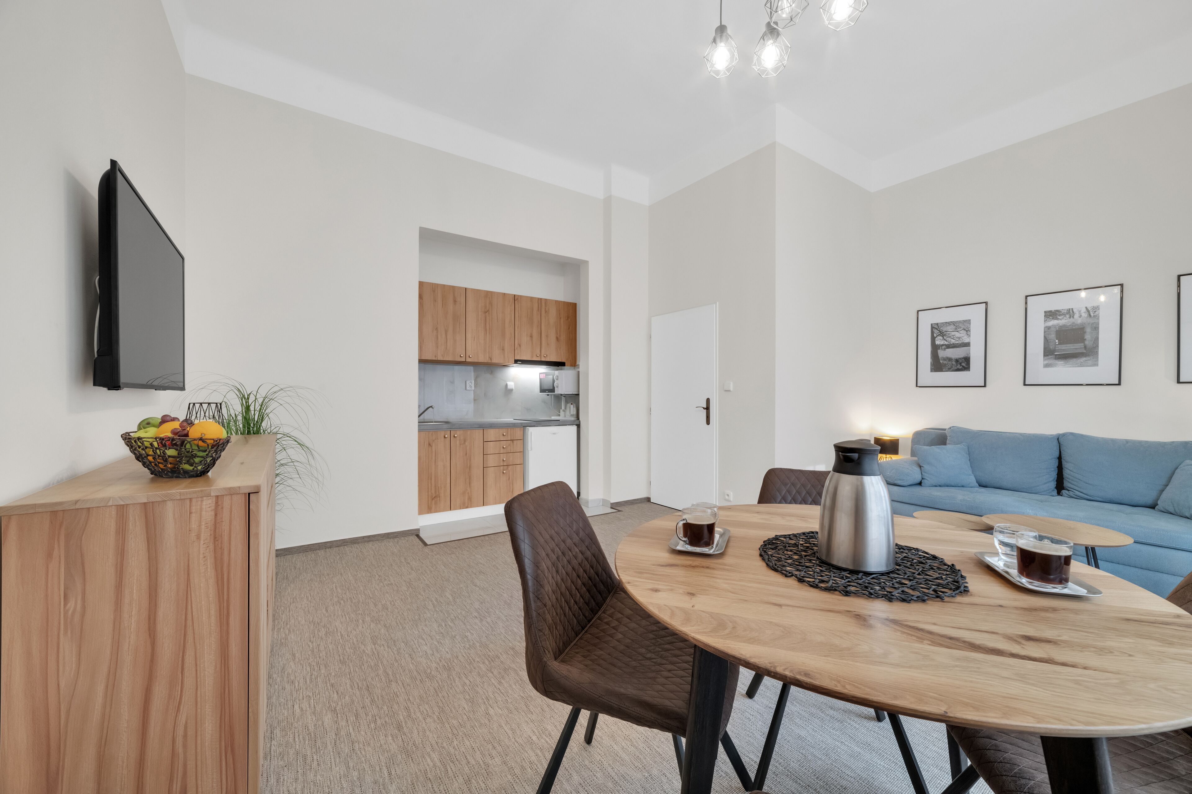 family room | in-room safe, desk, blackout curtains, iron/ironing board