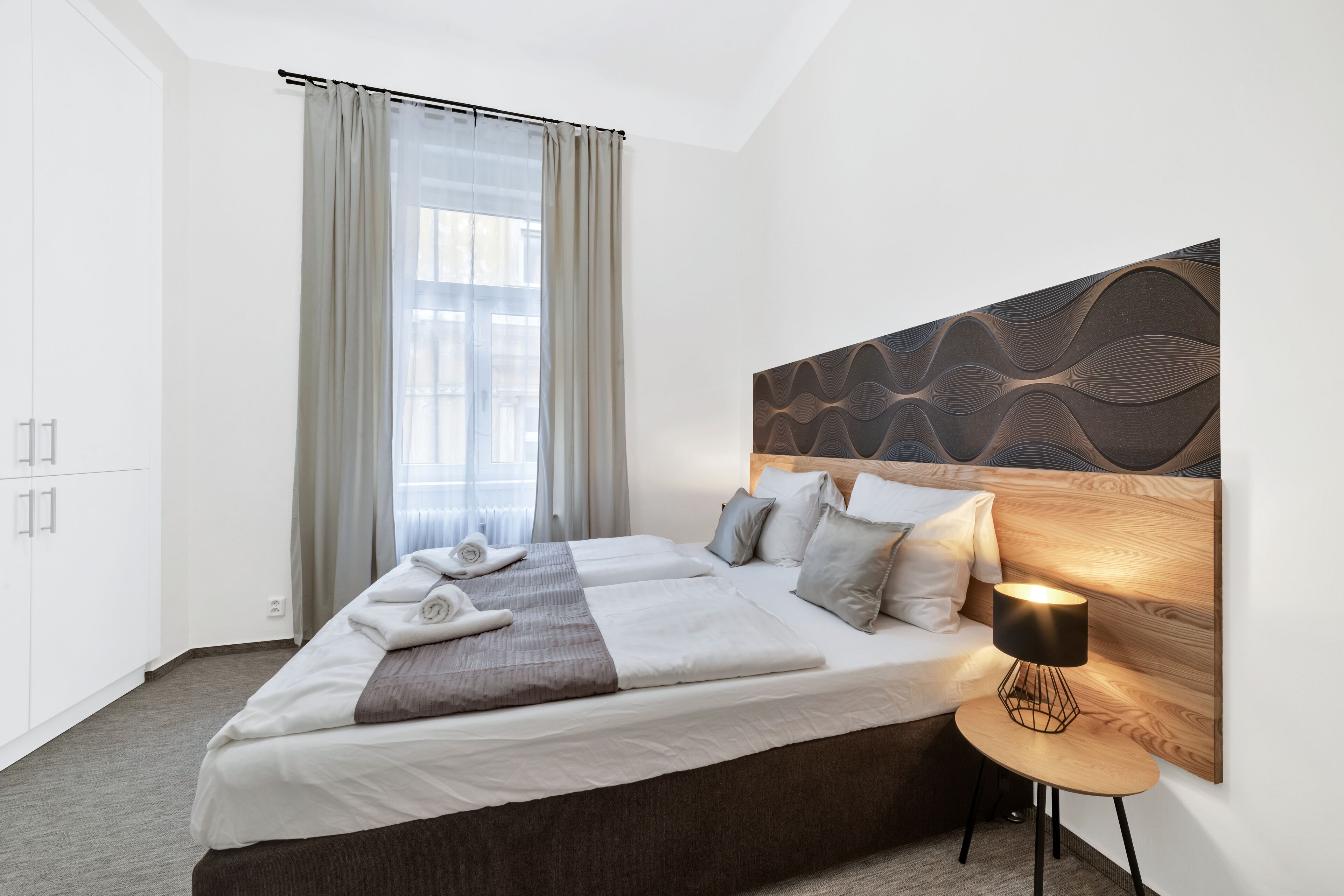 family room | in-room safe, desk, blackout curtains, iron/ironing board