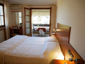 Double Room, Balcony | Down comforters, in-room safe, desk, rollaway beds