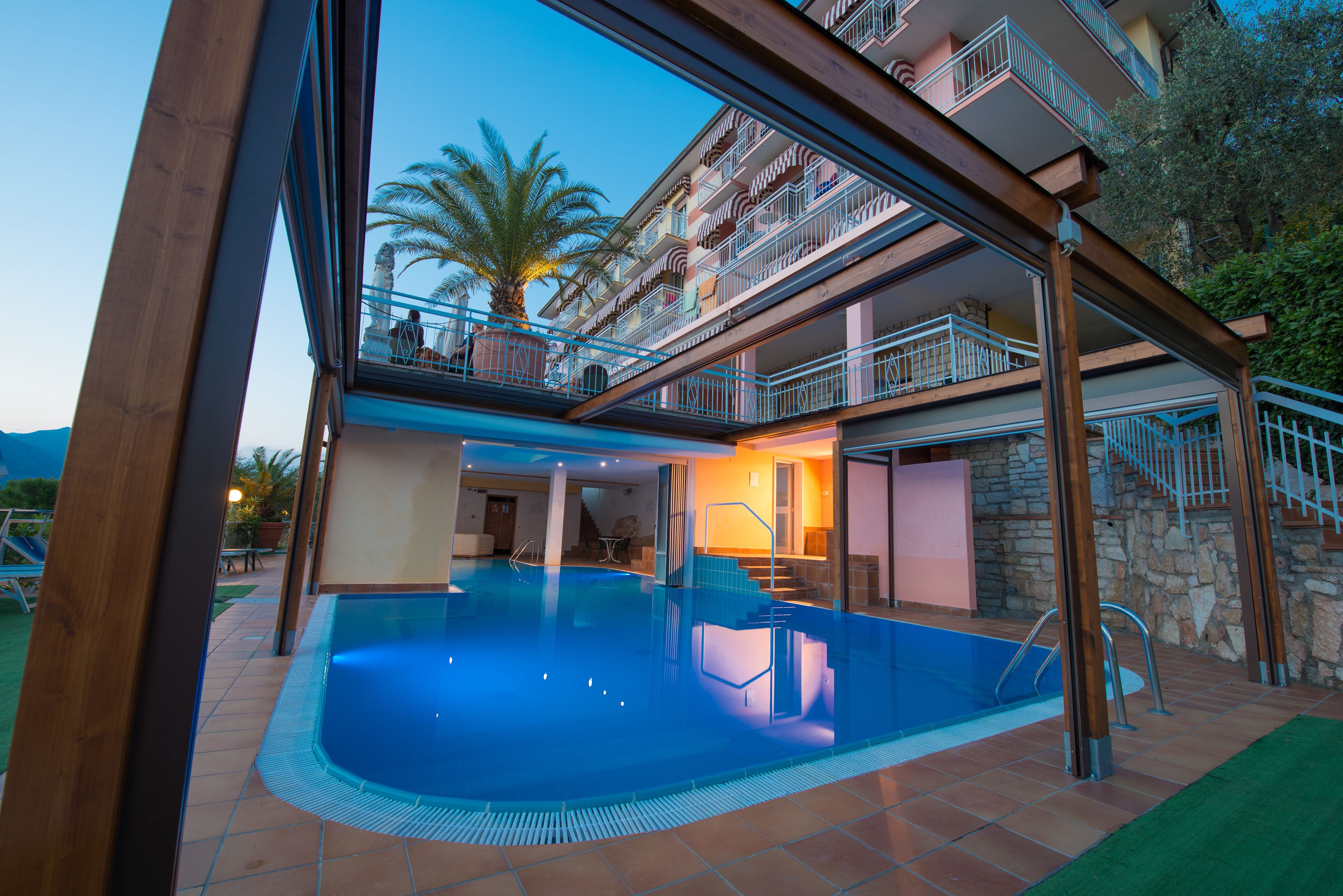 indoor pool, seasonal outdoor pool, pool umbrellas, pool loungers