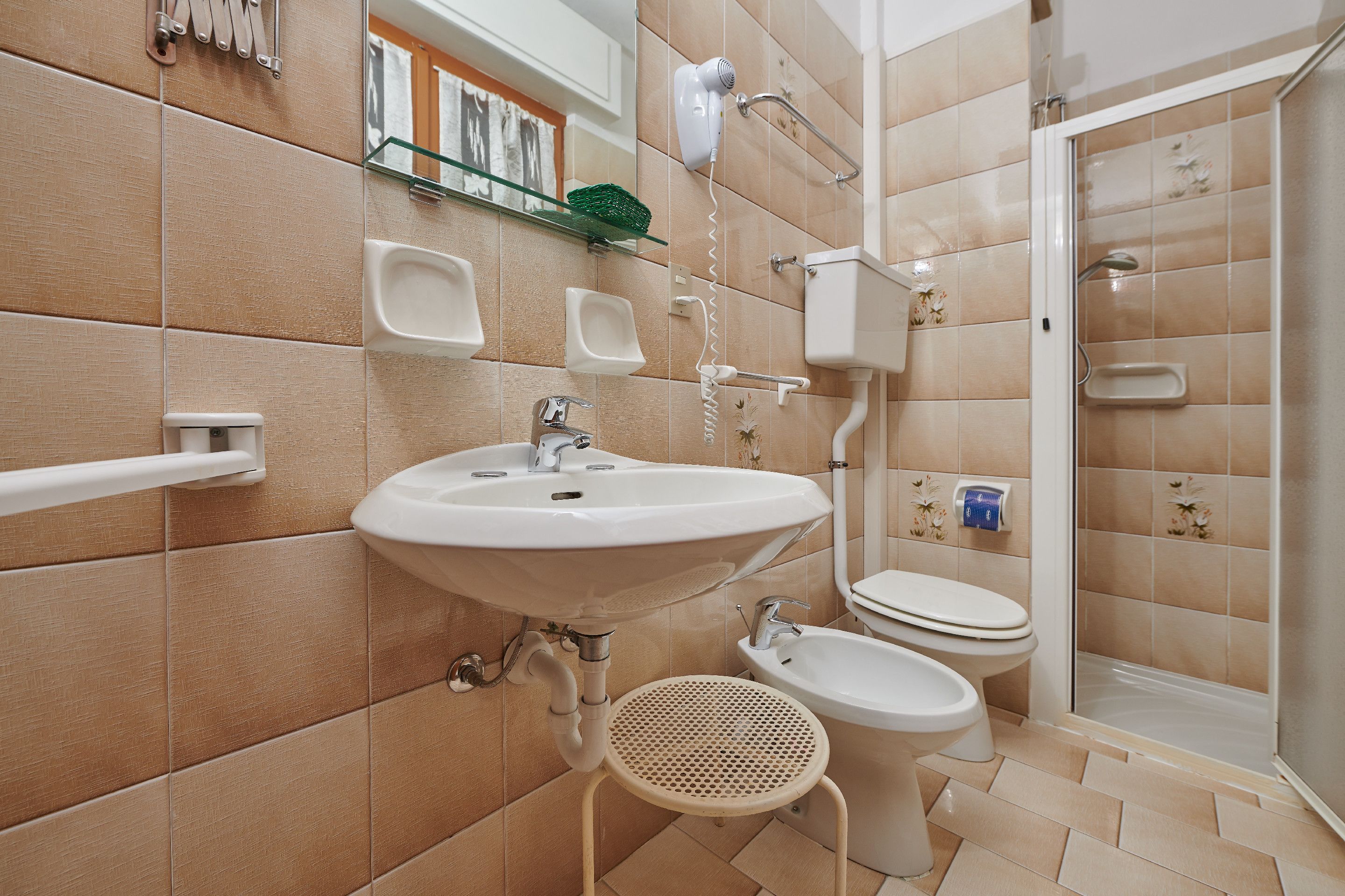 economy double room, 1 double or 2 single beds, balcony, garden view (lake view or mountain side) | bathroom | shower, free toiletries, hair dryer, bathrobes