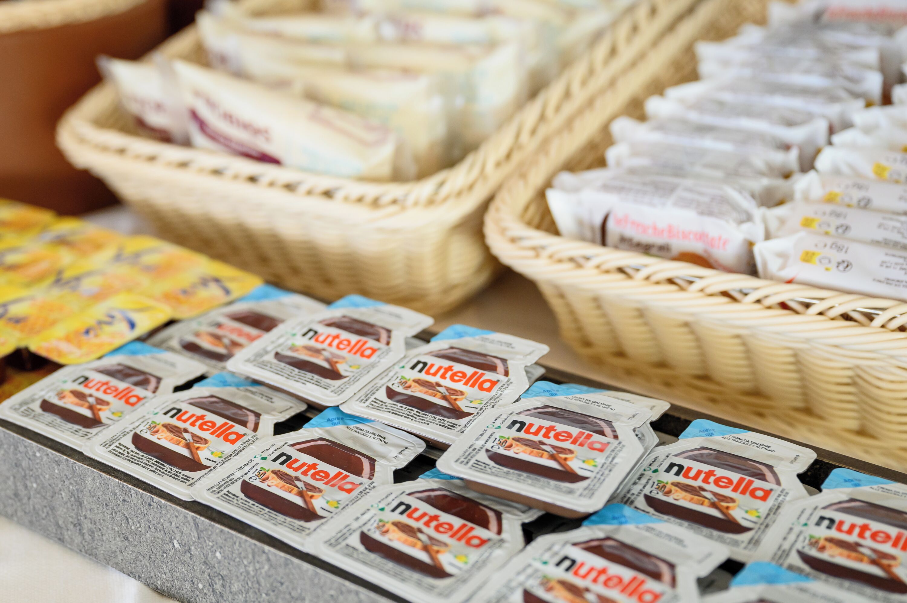 A display of Nutella jars and packets.