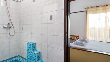 Egyptian cotton sheets, premium bedding, minibar, in-room safe