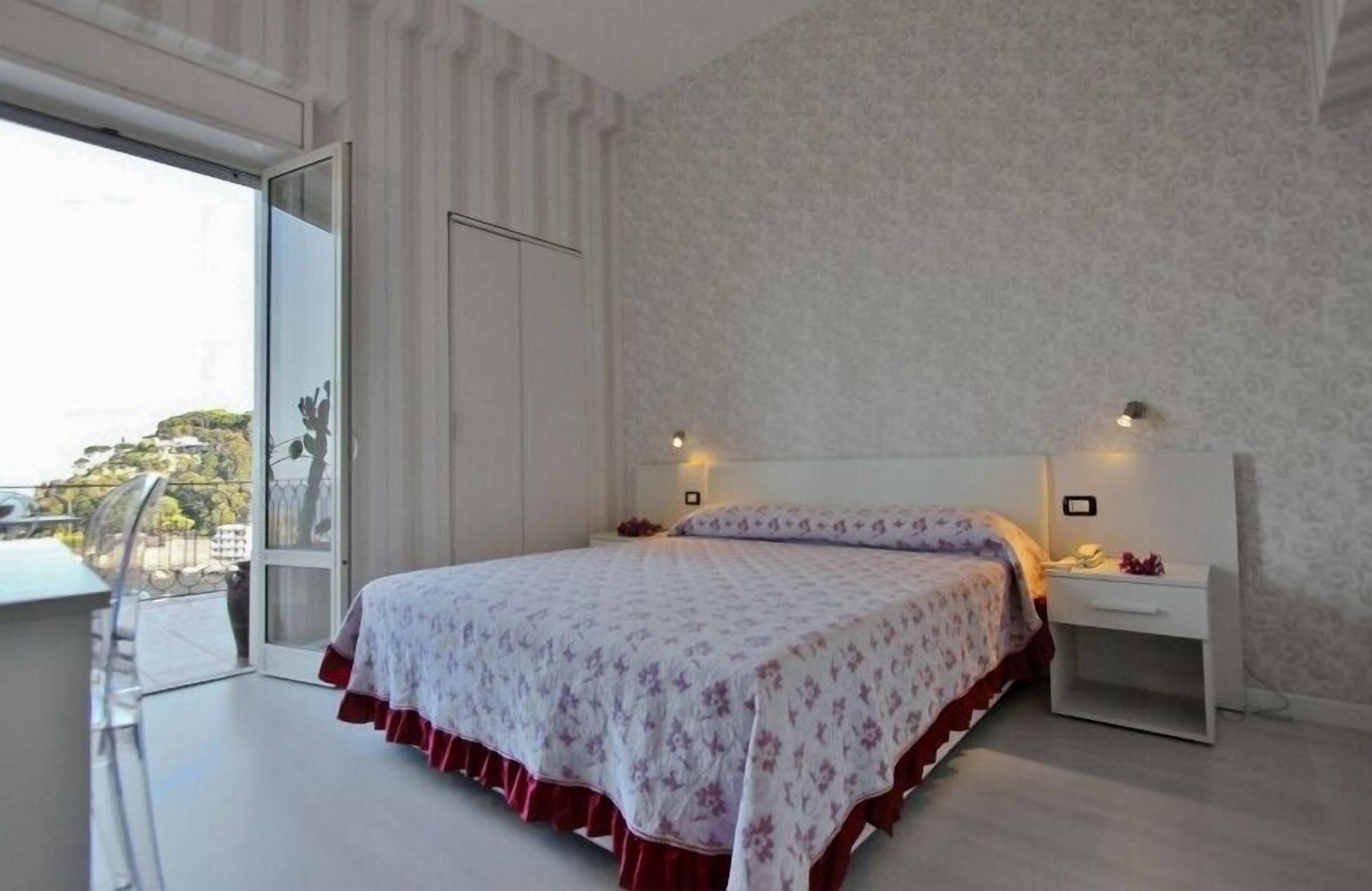 superior double room, balcony, sea view | minibar, in-room safe, individually decorated, cots/infant beds