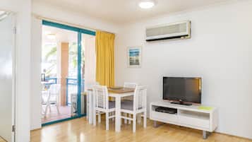 Superior Unit with Balcony | Living area | Flat-screen TV, DVD player
