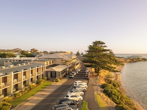 Enjoy stunning ocean views from the hotel's balcony overlooking the beach.