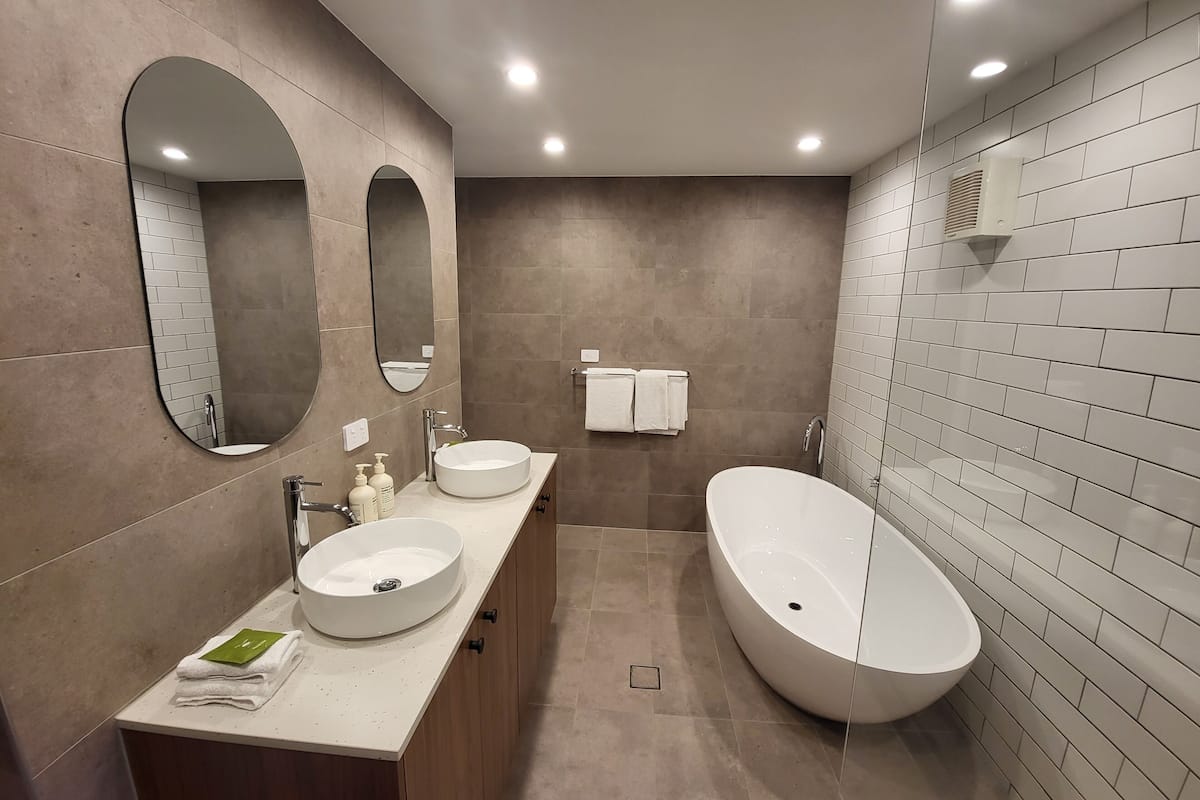 2 bedroom deluxe apartment | bathroom | free toiletries, hair dryer, towels, soap