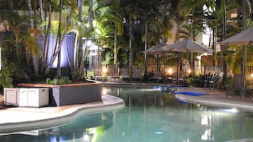 Outdoor pool, open 8:00 AM to 9:30 PM, pool umbrellas, pool loungers