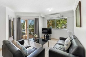 Apartment, 3 Bedrooms | Living area | TV, DVD player