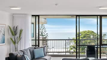 One-Bedroom Apartment - Superior Ocean View | Living area | 55-inch flat-screen TV with cable channels, TV